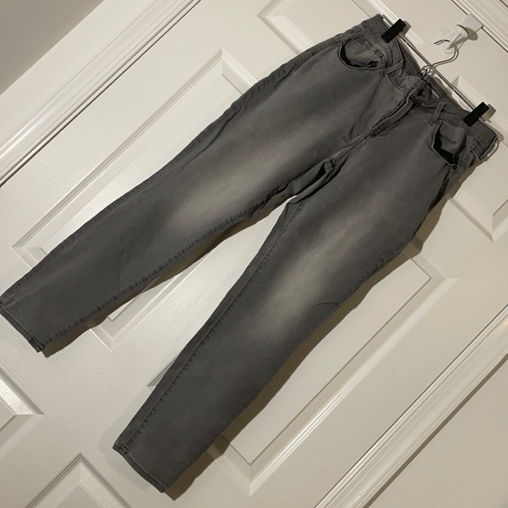 Grey pants .